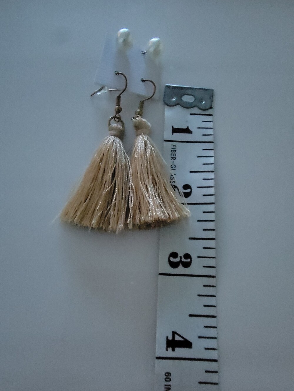 Tassel pierced earrings are unbranded  with Faux Pearls earrings